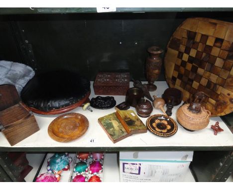 An assortment of wooden ware including chess board, trinket pots, upholstered foot stool etc. 