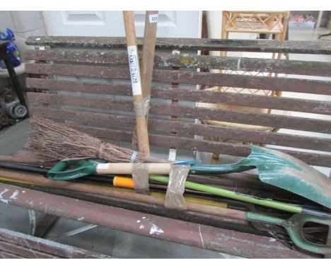 A quantity of garden tools.