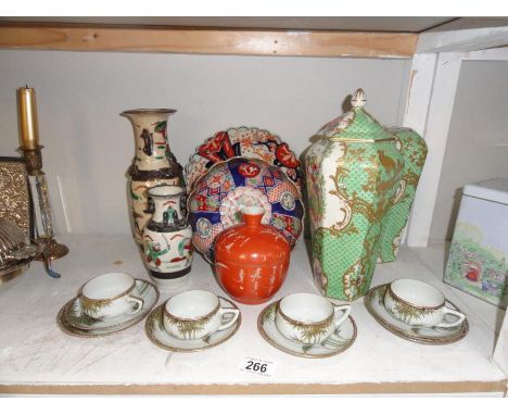 17 pieces of assorted oriental ceramics including cups and saucers, vases, plates etc.