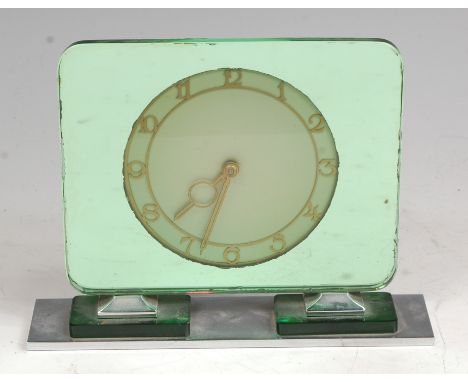 An Art Deco chrome and green glass tinted mantel clock, with circular dial with gilt metal chapter ring and handles, raised o