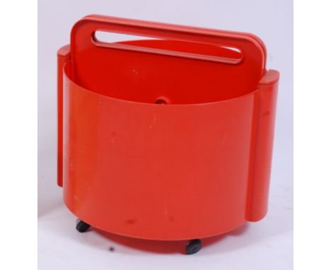 A 1980s Italian orange moulded polypropylene portable occasional table, with pull-up and fold-out leaves, raised on roller ca