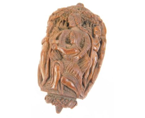 A 19thC or earlier nut, carved with various figures, to include a King with a trident, a female figure with a baby, a knight 