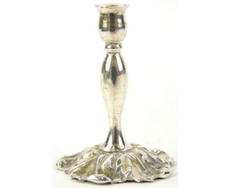 A Victorian miniature silver candlestick with leaf cast base, London 1885, 4cm H.