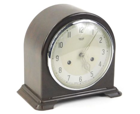 A Smiths of Enfield mantel clock, in a brown Bakelite arched case, 20cm H.