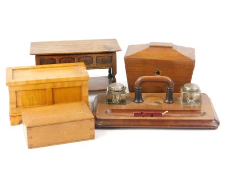A collection of wooden items, to include an Edwardian ink stand with marquetry fan, 19thC tea caddy, a satin walnut miniature