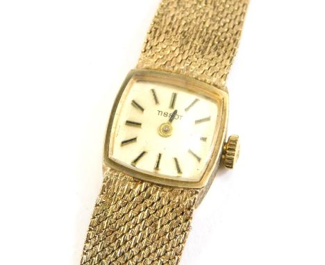 A 9ct gold Tissot ladies wristwatch, with square dial and applied stick markers, signed beneath 12, Tissot marked crown, with
