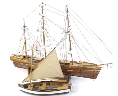 A scale model of The Cutty Sark, 98cm L, and a small single masted fishing smack, 36cm L (2)