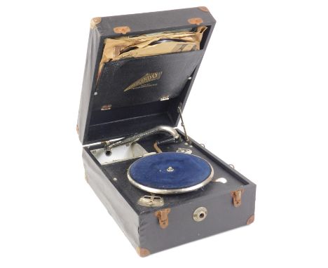A Decca crescendo black portable gramophone, and some records.