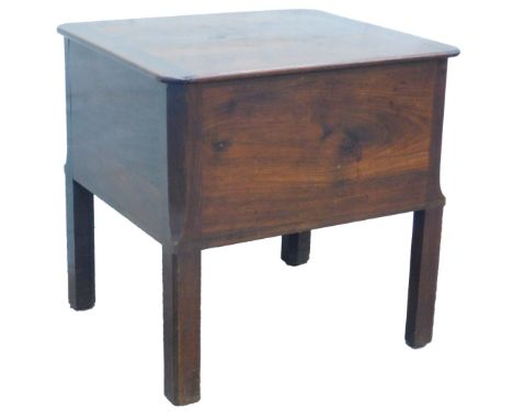 A George III mahogany box commode, the hinged top with rounded corners enclosing a vacant interior, above plain square sectio