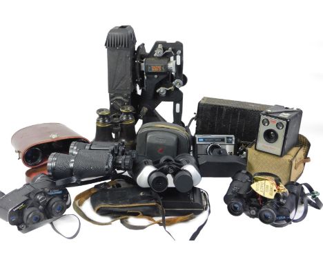 A collection of Tasco and various other pairs of binoculars, a Pathe home cinema projector etc.