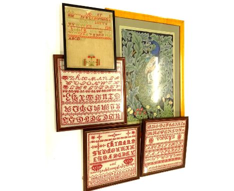 A late 19thC/early 20thC woolwork sampler, 33cm x 27cm, three other modern samplers, and a woolwork picture of a peacock, flo