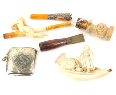Miscellaneous smoking related items, to include a carved meerschaum cheroot holder, decorated with a nude near classical fema