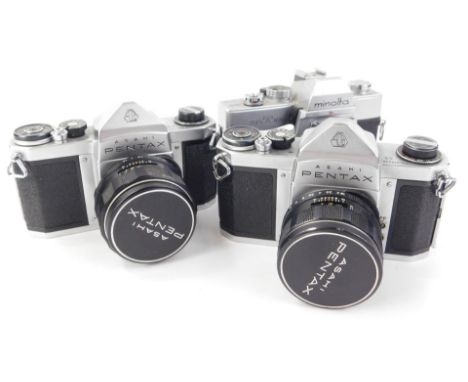 A collection of three cameras, to include a Pentax S3, S1 and a Minolta SRT 101