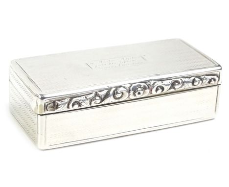 A 19thC silver rectangular snuff box, with engine turned decoration, engraved cartouche, with hinged lid enclosing a gilt int