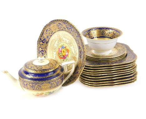 A Royal Worcester porcelain part tea service, comprising of a teapot and cover, sugar bowl, three saucers, ten square side pl