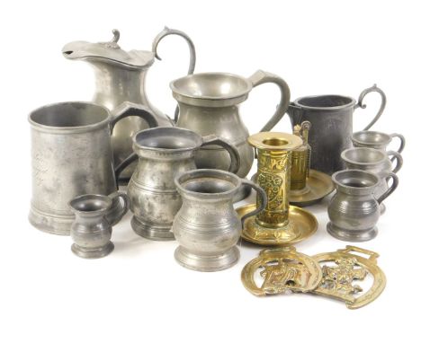 Miscellaneous metalware, to include pewter measures, an unusual brass Victorian candlestick with hinged match strike and cont