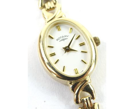 A Rotary ladies wristwatch, with oval watch head, on plated bracelet, yellow metal marked 9ct to watch head and strap, with R