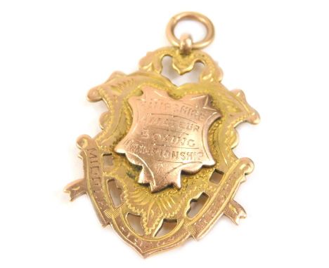 A 9ct rolled gold Hampshire Amateur Boxing Championship Middle Weight gold medal, dated 1920, 8g. 