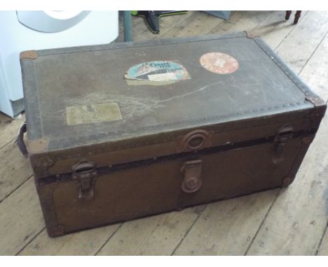 An old trunk with Cunard stickers labelled 'Lucitania sailing from New York to Southampton'