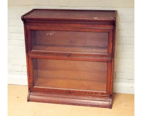 A two section oak Globe Wernicke bookcase 87cms wide 90cms high 