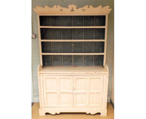 A cream painted pine Irish dresser with shelf back and cupboards under 49" wide 