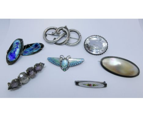 A collection of silver brooches, oval rock crystal brooch, enamel brooches and enamel earrings   Excellent condition