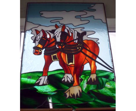A large lead light coloured glazed panel of cart horses  