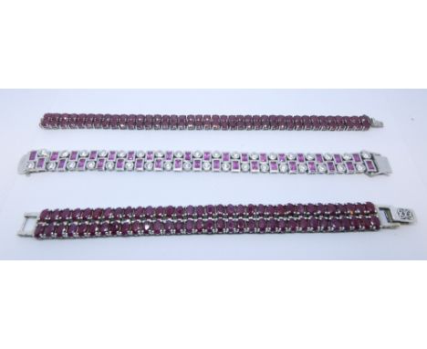 Three modern silver ruby and CZ bracelets 