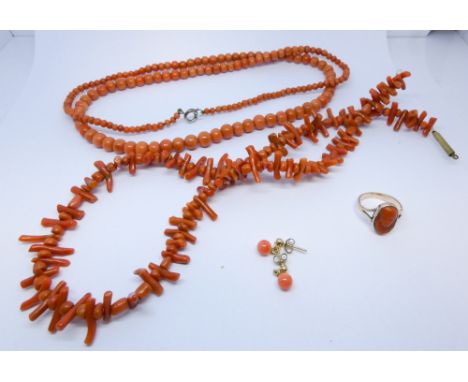 Stick Coral necklace, graduated coral bead necklace, a pair of coral bead drop earrings and an antique coral set signet ring 