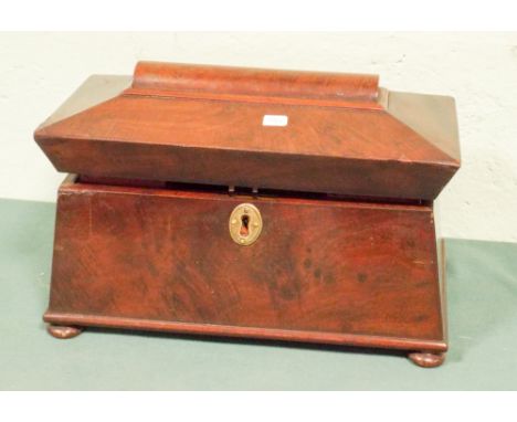A Victorian sarcophagus shaped mahogany tea caddy 