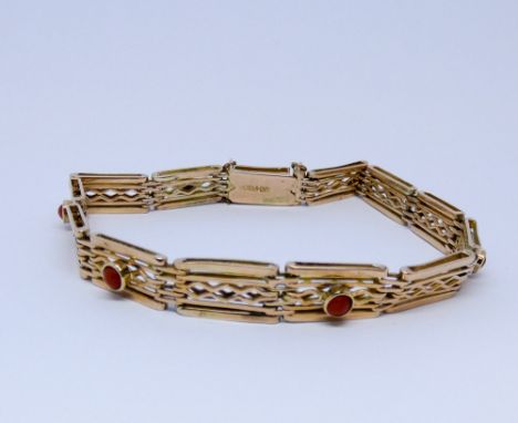 9ct rose gold gate bracelet, set alternate panels with cabochon coral beads, safety chain and box clasp. 12.5 grams   Bracele