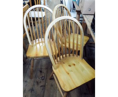 Three light pine stick back Windsor dining chairs 