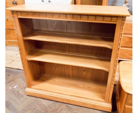 An Ercol Windsor pattern light open bookcase 38" wide 38" high   In very good condition - no major damage or repair visible