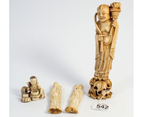 A collection of four Japanese ivory netsuke and figures. 16 cms tallest  The large figurine is in good condition with no visi