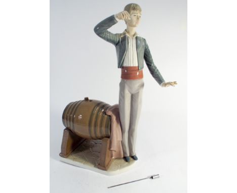 A large Lladro figurine of a Spanish wine taster height 37cms tasting ladle detached 