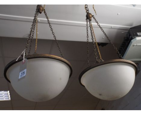 A pair of 1920's hanging bowl shaped electric light pendants 