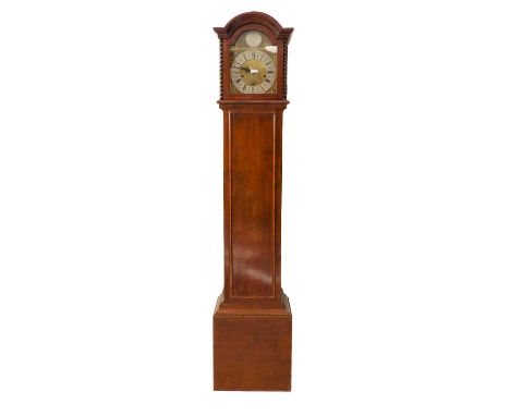 A 1930s oak-cased eight-day grandmother clock: silvered chapter ring with Roman numerals and flanked by mask-style spandrels;