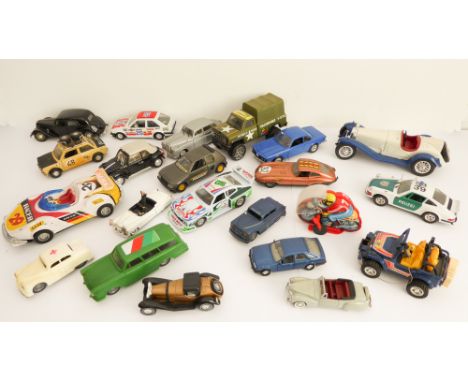 Twenty-three medium-scale diecast toys to include:the largest an Alfa Romeo Spider measuring 24.5 x 11 x 8 cm (Burago);a wind