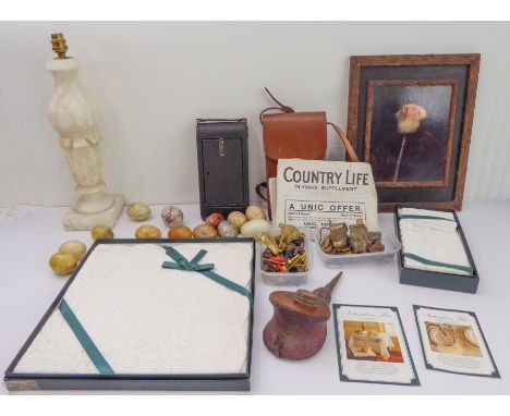 Interesting collectibles comprising:a carved alabaster lamp (35 cm high including fitting);a cased Kodak camera;13 polished h