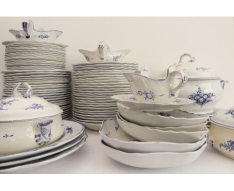 A large and very fine continental dinner service decorated in cobalt blue with sprigs and flower heads and comprising:15 x 23