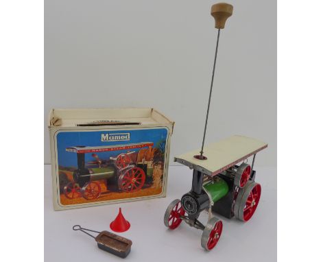 A Mamod model&nbsp;steam tractor: boxed, in good condition, and with accessories