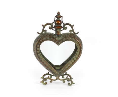 A copper heart shaped lantern