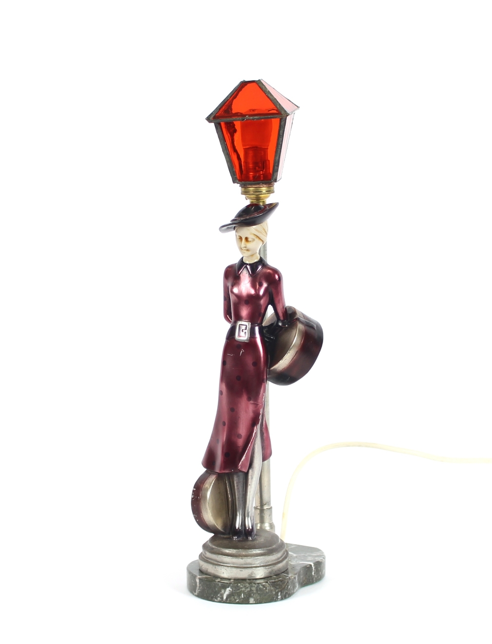 An Art Deco design table lamp, in the form of a lady standing beside a