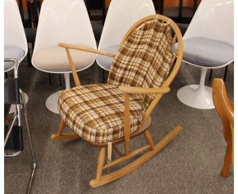 An Ercol stick back rocking chair