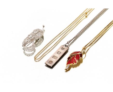 A silver fob; a 925 mark silver leaf brooch; a yellow metal and enamel decorated leaf pendant hung to a fine link chain; a si