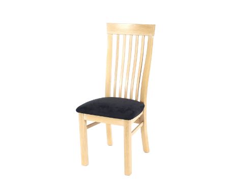 A set of eight modern light oak slat back dining chairs, with upholstered seats, raised on square section supports