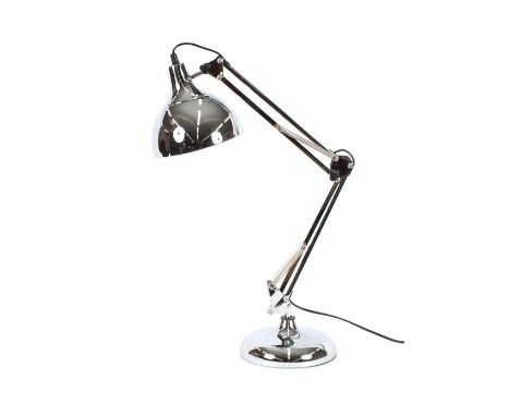 A large chrome Angle Poise style lamp