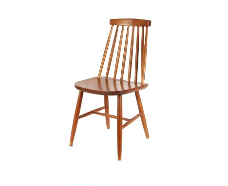 A set of four Ercol style stick back kitchen chairs