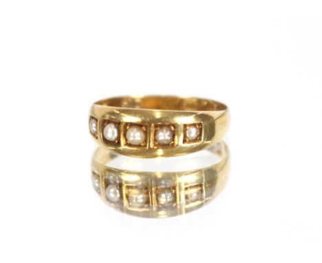 A 15ct gold and pearl set ring 