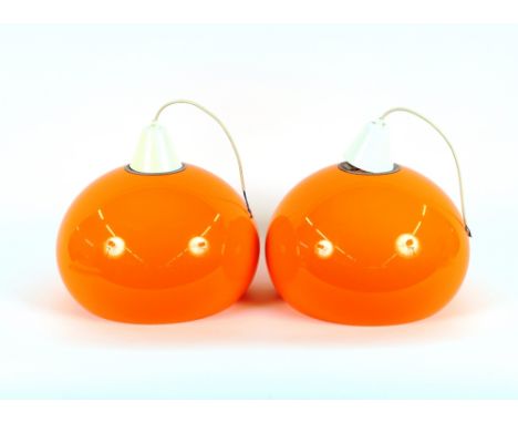 A pair of orange 1970's lamp shades